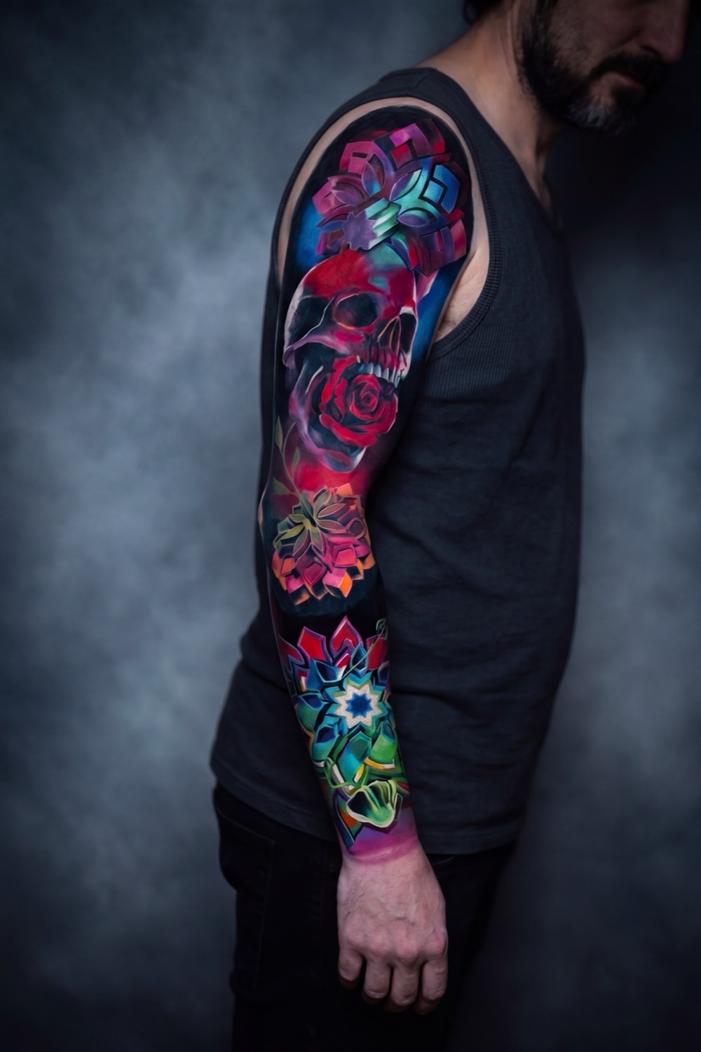 Full-colour sleeve — skull, rose and geometry