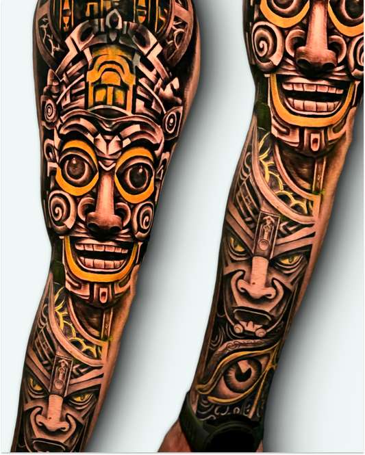 Full sleeve — golden mask & ornamental motifs (forearm/upper arm)